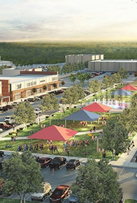 Baytown, Texas. Aerial view of a public area with tents and a fountain in the middle and trees lining the sides.