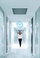 Electro-Federation Canada. A woman walks down a hallway.