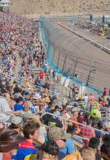 ISM Raceway fans watching a race.