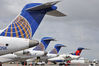 Grand Junction Regional Airport, a row of jumbo jet tails parked.