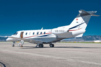 Rocky Mountain Metropolitan Airport, a plane on the runway with the door open.