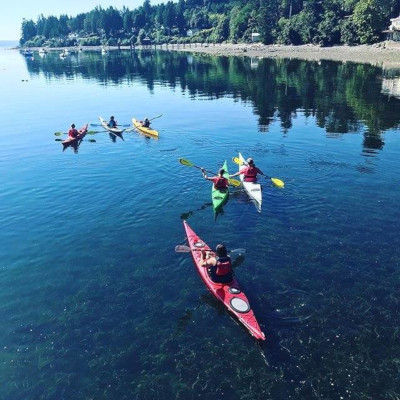 Cowichan Valley Regional District British Columbia; A group of kayaks on the water.