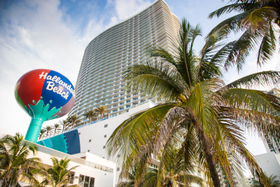 Hallandale Beach, Florida hotel with a water tower that says Hallandale Beach.