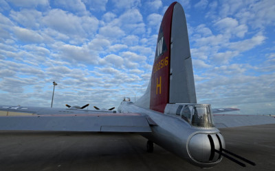 Lubbock Preson Smith International AIrport B17 on the runway with spotted clouds above.