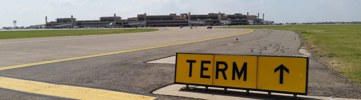 Lubbock Preston Smith International Airport TERM sign pointing towards their terminals.