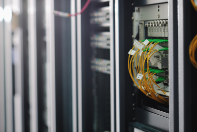 Worldwide Supply internet network server room with server racks.