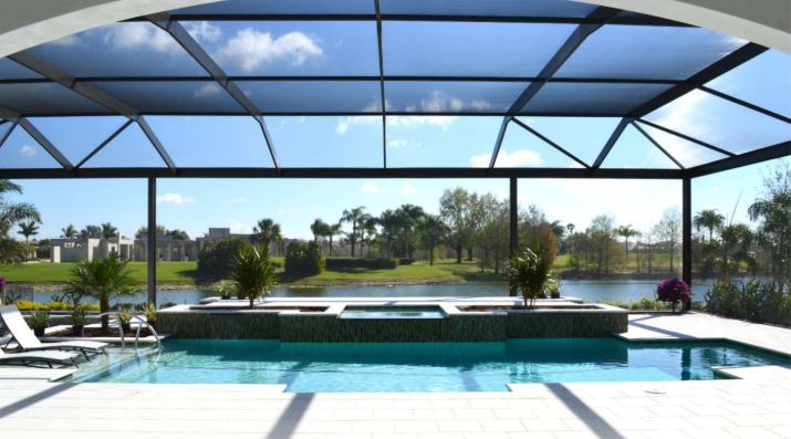 Town & Country Industries pool with a pool screen enclosure.
