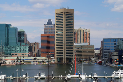 US Green Building Council. Baltimore city view with water and boats in front.