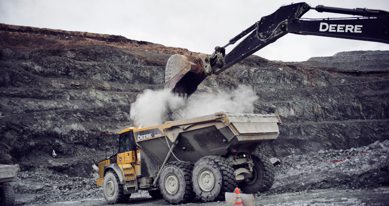 Anaconda Mining, Pine Cove open pit mine. An excavator fills a large dump truck.