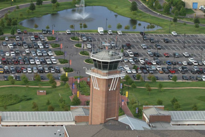Alexandria International Airport & England Airpark control tower and parking lot.