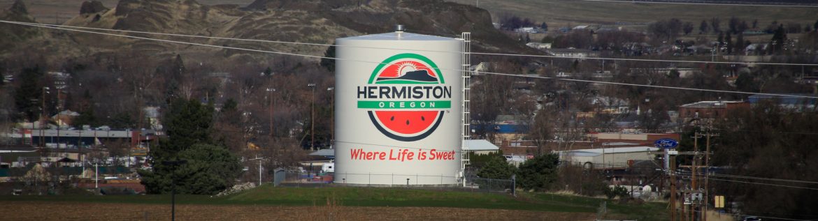 Hermiston, Oregon. Water tower in Hermiston with their logo and tagline saying Where Life is Sweet.