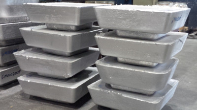 Great Lakes Die Cast Corp. Stacks of metals ingots.