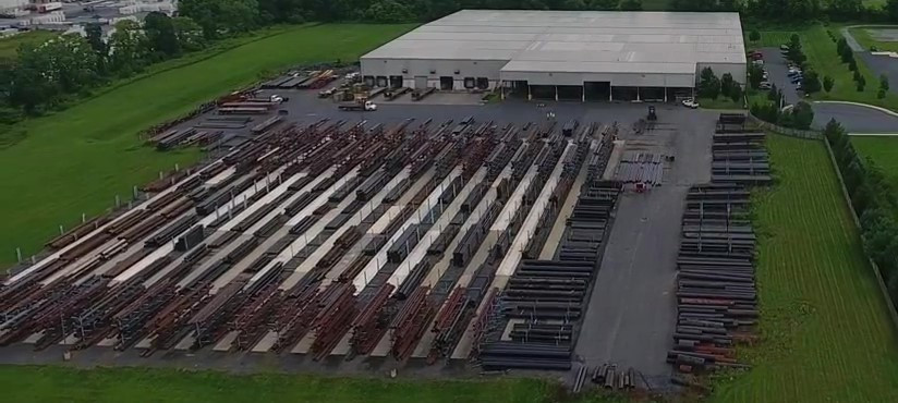 Tioga Pipe Inc. Forks Distribution Center Aerial view showing a large building and storage area for pipes.