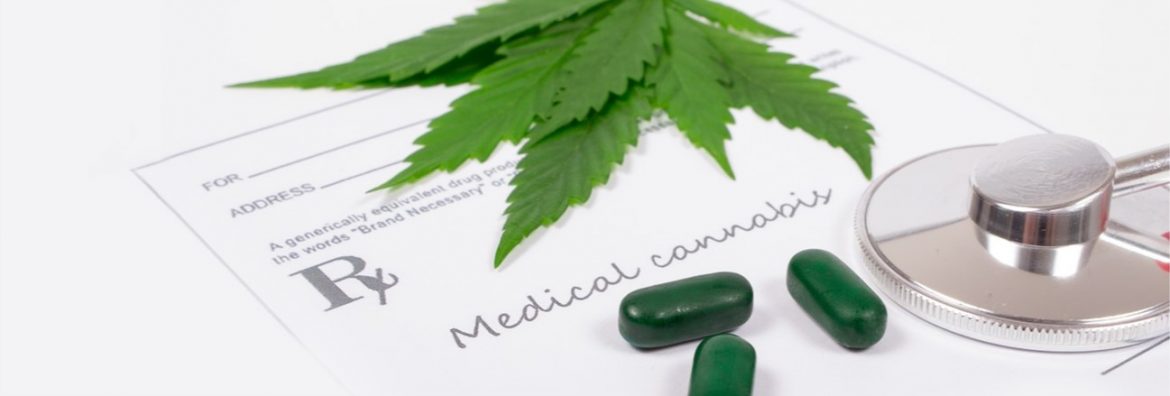 Canntab therapeutics cannabis leaf on a prescription paper with pills and a stethoscope.