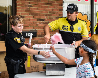 Reynoldsburg, Ohio Police giving out cotton candy to children.