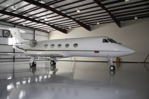 Thomasville Regional Airport jet inside of a hangar.