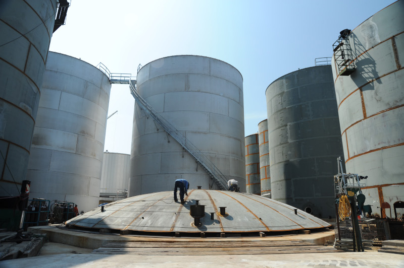 The Fisher Tank Company example of work showing mutiple metal tanks being assembled in one area.