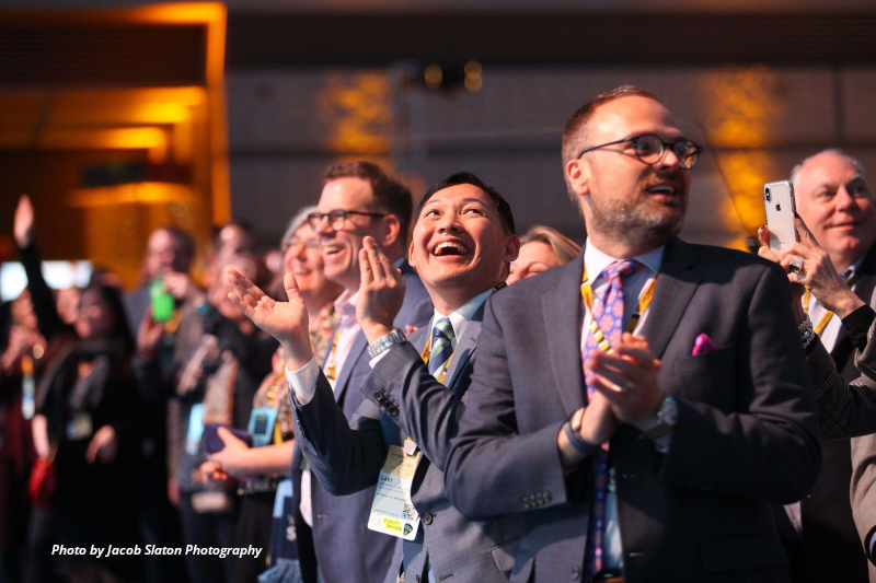 PCMA Convening Leaders in Pittsburgh 2019, clapping hands and smiling.