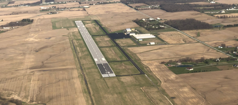 Allen County Regional Airport aerial view of the runway and surrounding area.