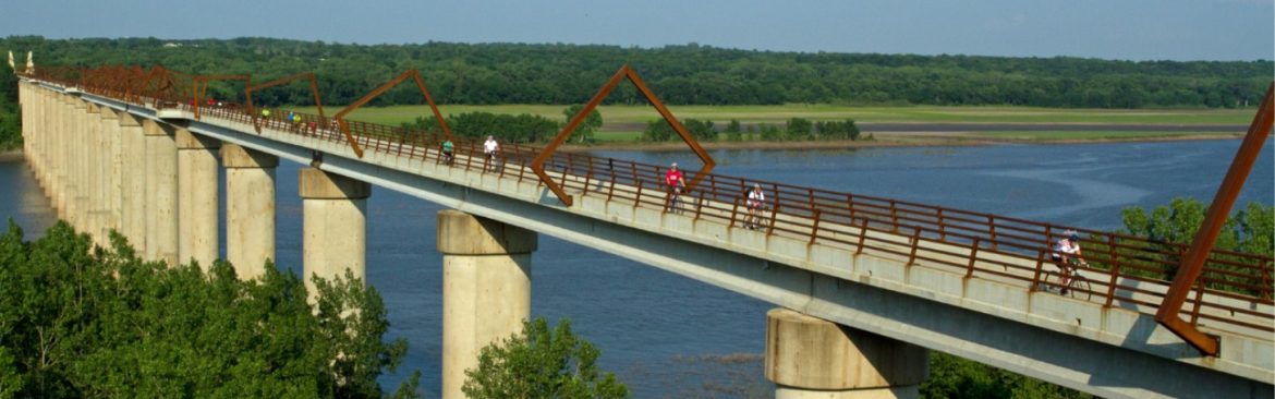 Boone County, Iowa recreation bridge over water with tree around.