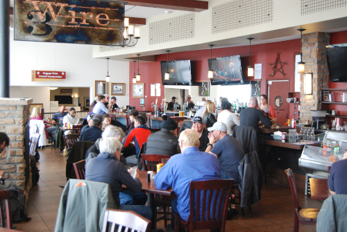 Yampa Valley Regional Airport 3 Wire Restaurant with patrons eating.