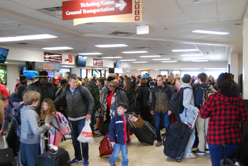 Yampa Valley Regional Airport's busy baggage claim area.