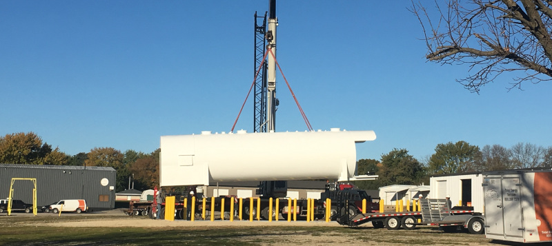 Acterra Group crane lifting a structure.