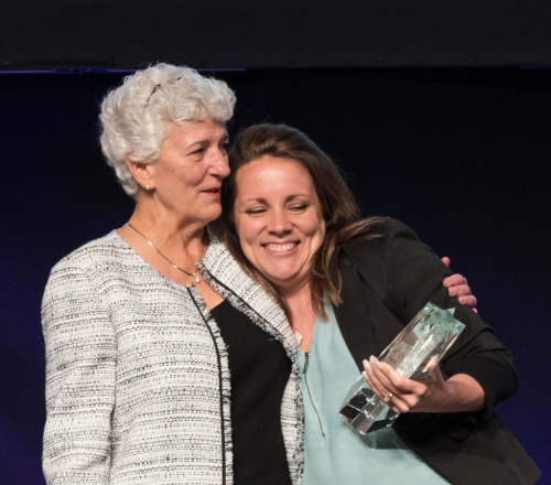 Century 21 Judge Fite Company, Jan Fite hugging an award winner.