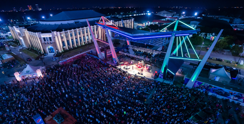 Expo Square aerial view of a band playing at night.