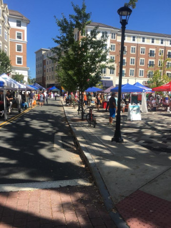 Mansfield, Connecticut city street view with vendor tents.