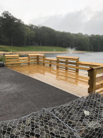 Mansfield, Connecticut new wooden deck along the waters edge.