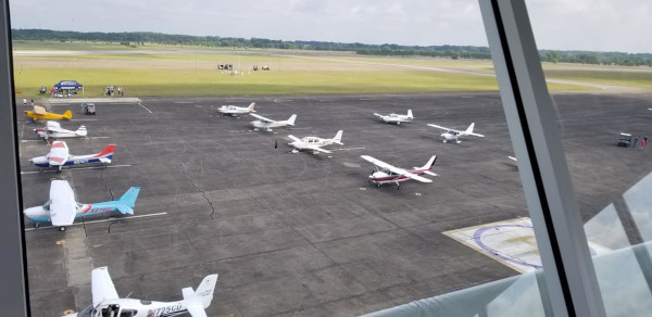 Marianna Municipal Airport view of small planes parked on the tarmac from the control tower.