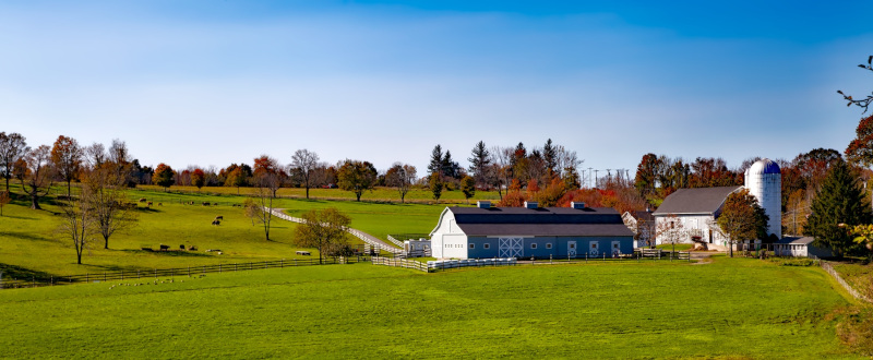 South Windsor, Connecticut farm with green hills and trees in the distance.