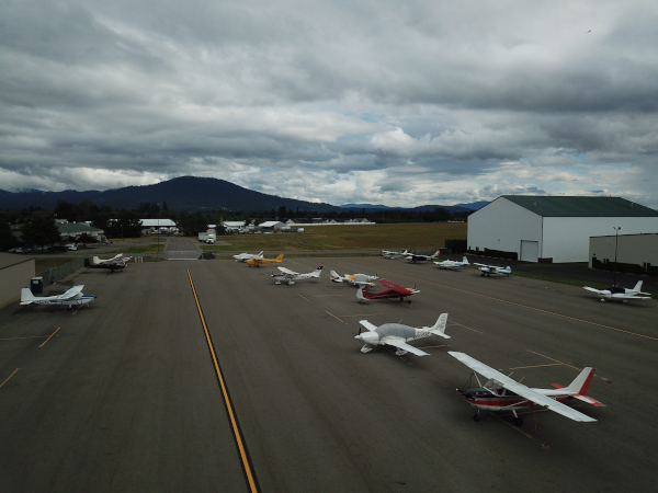 Coeur d’Alene Airport (Pappy Boyington Field) view of a bunch of small craft parked on the airport grounds.