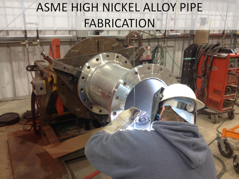 Great River Industries ASME High Nickel Alloy Pipe Fabrication with an employee working on a pipe.