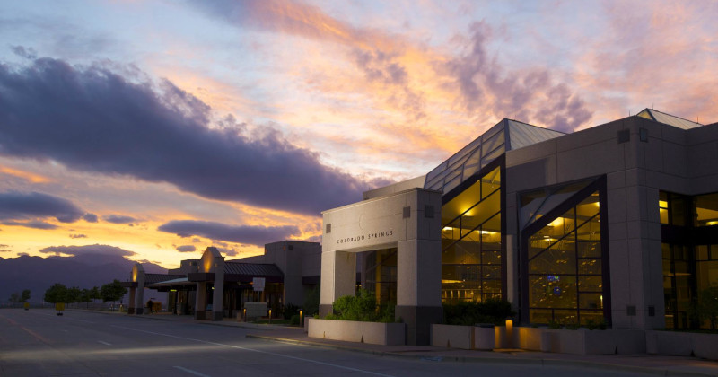 The Colorado Springs Airport, entrance to terminal building near dusk.