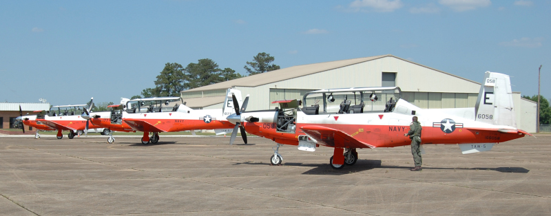 The Craig Field Airport Navy Planes in a row.