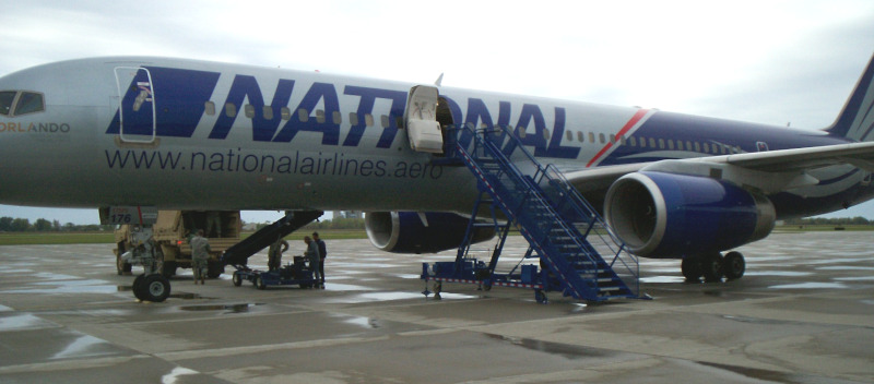 Huron Regional Airport, National Jet in between flights with crew working to load/unload.