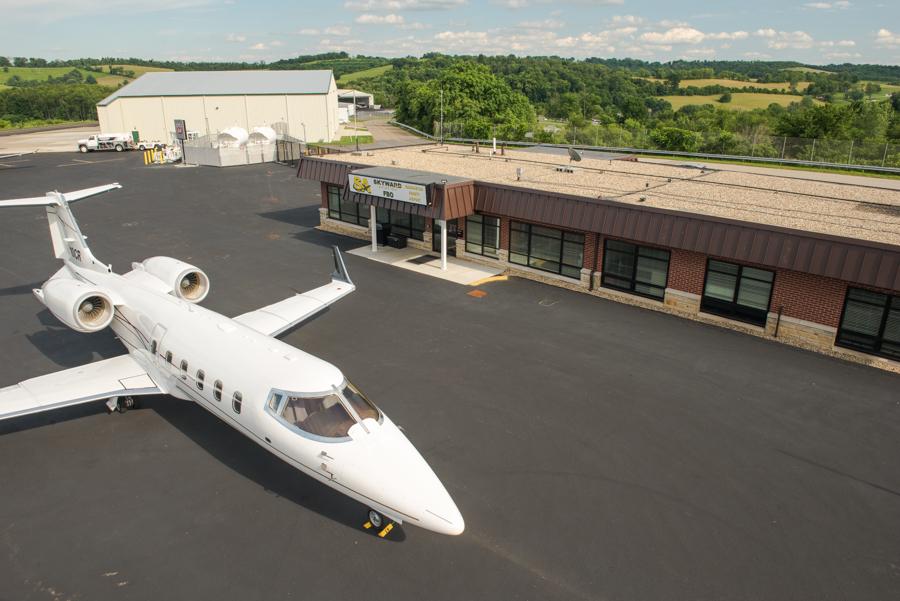 Washington County Airport FBO Exterior with a jet out front.