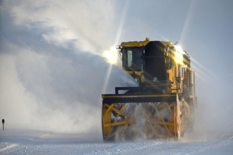 Great Falls International Airport snow removal vehicle in action.