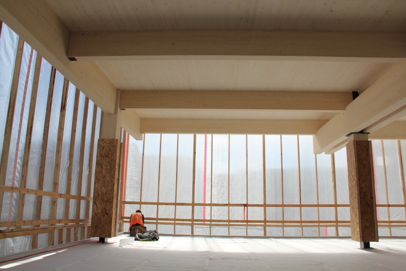 Maxxon Corporation Construction Site with worker in corner.