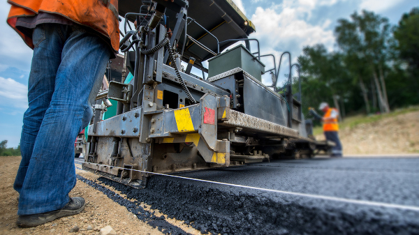 Canadian Public Works Association CPWA stock image of paving a road.