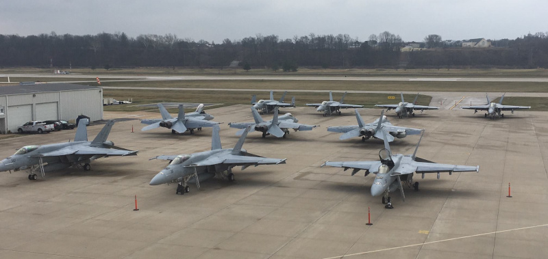 Spirit of St. Louis Airport military jets on the ground.