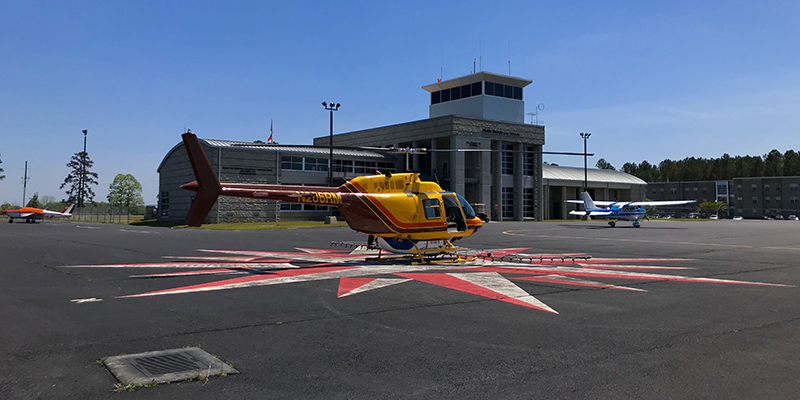 The Heart of Georgia Regional Airport is located three miles east of the City of Eastman in South Central Georgia, and services general aviation air traffic from all over the southeast United States. The Airport was originally built by the State of Georgia for the Stuckey’s Corporation to support its business operations. “Mr. W.S. Stuckey, who started the candy company here in Eastman, Georgia, selling pecan log rolls by the side of the road, kept expanding and started putting stores all up and down the Interstate,” explains Airport Manager, Jeff Fordham. “They had a Piper Aztec, and their airstrip was not long enough, so they came out here and built the Airport because they needed a place to land their bigger planes.” When the facility was officially dedicated in December 1966, then Governor Carl Sanders hailed the $232,000 Eastman-Dodge County Airport as “the first community airport in Georgia that we have built specifically to accommodate the modern business jet airplanes that are becoming so important in one industry after another.” Today, the Heart of Georgia Regional Airport is owned and operated by Heart of Georgia Regional Airport Authority and is overseen by a seven-member Board of Directors, made up of two members from the Eastman City Council, two members from the Dodge County Board Commissioners Office – one is a sitting board member from each of those, and one is an at-large appointment - and two members from the Dodge County-Eastman Development Authority – one is a board member, one is an at-large appointment. The seventh member is appointed by the Georgia House of Representatives. The Airport’s original 4,500-ft. runway was lengthened to 6,506 feet in 2004, and equipped with a precision instrument landing system and a landing capacity of 100,000 pounds. A new terminal and tower were completed in 2005. The Airport supports between 300-400 operations per day, comprised of general aviation, corporate, military, flight training, customs and border patrol, air ambulance, and aerial agricultural traffic, making it the 5th busiest take-off and landing airport in the state. Over the last several years, the Heart of Georgia Regional Airport has also become a major aviation education presence in the Southeast. It is home to Middle Georgia State University’s Aviation Center – Georgia’s only state-supported aviation center – which trains pilots and airport and airline management majors, while giving airframe and power plant students the skills required to build and maintain aviation assets. The school’s flight program is FAA-approved, and its campus at the Airport is home to a fleet of 30 airplanes, four helicopters, and several advanced simulators used in training and instruction. In 2007, the school’s Air Traffic Control Management program was named the top new ATC program in the nation by the FAA. The Airport is also home to several aviation manufacturing and maintenance firms. Fordham Aviation Inc. provides aircraft maintenance services; KENCOA Aerospace LLC is a premier Tier-1 supplier of multi-axis precision machined and sheet metal fabricated aerostructures, jet engine components, and major assemblies for commercial, military, and business/regional jets, worldwide; AREMAC Heat Treating East, LLC, is a nationally recognized heat treatment company; and Valence Surface Technologies is a full-service metal finishing company for the aerospace industry. Machining, heat treatment, and finish coating, located next door to each other on the same airport – a unique capacity that isn’t repeated anywhere in the country – means a much faster turnaround for parts manufacturing and final delivery to companies such as Boeing, Airbus, Lockheed-Martin, Gulfstream, and Sikorsky. All of this activity means that the Heart of Georgia Regional Airport plays a vital role in supporting the region with 376 jobs with an annual payroll of $14,700,000, and $37,169,000 in economic output for the local and regional economies. As airport tenancy continues to grow – there are currently around 60 private and corporate home-based aircraft on property - Fordham says that he would like to see more hangars built by private developers - as opposed to the county footing the bill. “Right now, everything is owned by the Airport and rented out. We have 18 hangars and they’re all full. There’s a lot of land on the west side of the airport; most everything has been developed on the east side. I think there’s a couple of hundred acres, at least, that’s available to develop with more to be obtained if we need it,” he notes. “We’re getting ready to do an apron re-hab project – we’re still working on the cost for that; it should be somewhere around a million dollars. We also want to put in a taxiway into an area where we can build more hangars or have ground leases so others can build hangars. I think it’s better if people build their own hangars.” Fordham says that the Airport’s 6,506-ft. runway is currently able to handle any normal traffic. “There was some talk about lengthening the runway, but we haven’t gotten that solidified yet,” he shares. “Right now, we’ve got a very good runway with two parallel taxiways and the pavement is in pretty good shape. So, I don’t foresee having any resurfacing projects within the next five years or so.” Regarding any potential competition from nearby airports, Fordham says that Heart of Georgia has lots of services available that one wouldn’t necessarily find elsewhere. “We have everything from catering, to courtesy cars, to 24-hour fuel availability for jets and pistons,” he reports. “And our normal operating hours are a little bit longer; we’re open 8-5 Monday through Saturday, and 12-5 on Sunday. And we don’t mind staying till seven or eight o’clock at night if we need to. A lot of airports, after a certain hour, you can’t get anybody; but we’re pretty much available 24/7 if anyone calls. With COVID, we had to cut back on our hours, but we try to pride ourselves on our accessibility and our customer service.”