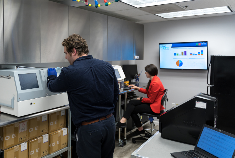 SNA International employees working in the office.