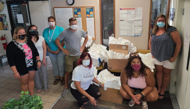 Utilities Employees Credit Union employee group wearing masks.