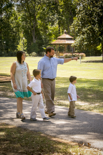 Millbrook, Alabama family in the park walking